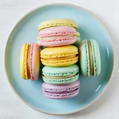 Bria FIBO — A stack of colorful macarons on a pastel blue plat