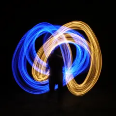 FLUX.2 [dev] — Intertwining ribbons of light in blue and gold aga