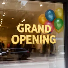 FLUX.2 [dev] — A storefront window with GRAND OPENING painted in 