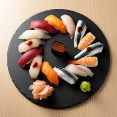 FLUX.2 [flex] — A perfectly plated sushi omakase on a black slate 