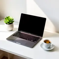 FLUX.2 [flex] — A sleek laptop on a clean white desk with a potted
