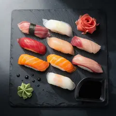 FLUX.2 [max] — A perfectly plated sushi omakase on a black slate 
