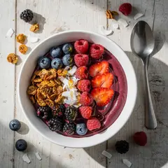 FLUX.2 [max] — A colorful acai bowl topped with fresh berries, gr