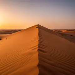 FLUX.2 [max] — A desert sand dune at sunset with long shadows, Sa