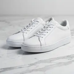 FLUX.2 [pro] — A pair of white leather sneakers on a marble count