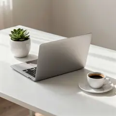 FLUX.2 [pro] — A sleek laptop on a clean white desk with a potted