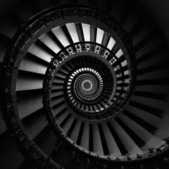 FLUX Pro 1.1 — A spiral staircase viewed from directly above, geo