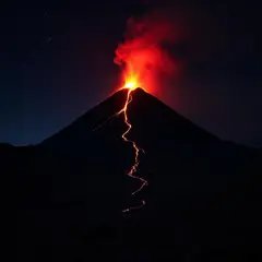 FLUX Pro 1.1 — A volcano erupting at night with lava flowing down