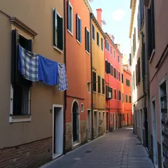 FLUX.1 [schnell] — A narrow cobblestone alley in Venice with colorful