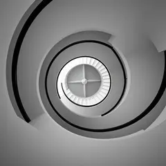 FLUX.1 [schnell] — A spiral staircase viewed from directly above, geo