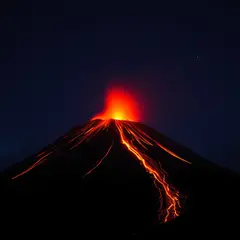 FLUX.1 [schnell] — A volcano erupting at night with lava flowing down