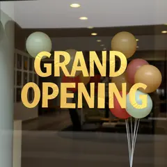 FLUX.1 [schnell] — A storefront window with GRAND OPENING painted in 