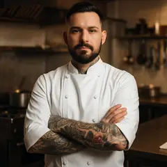 GPT Image 1 Mini — A tattooed chef in a white coat, arms crossed, con