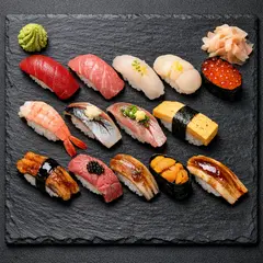 GPT Image 1.5 — A perfectly plated sushi omakase on a black slate 