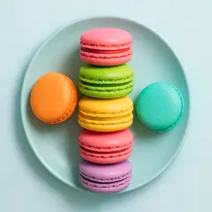 GPT Image 1 — A stack of colorful macarons on a pastel blue plat