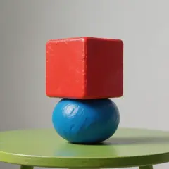 Hunyuan Image 3.0 — A red cube on top of a blue sphere, both sitting o