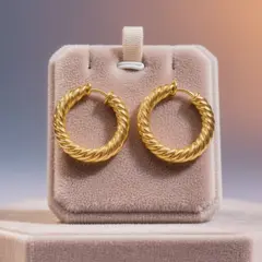 Hunyuan Image 3.0 — A pair of gold hoop earrings on a velvet jewelry d