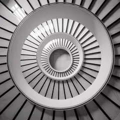 Ideogram V3 Turbo — A spiral staircase viewed from directly above, geo