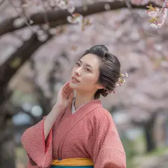 Ideogram V3 Turbo — A Japanese woman in a red kimono standing under ch