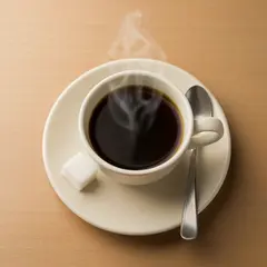 Imagen 4 Fast — A cup of coffee on a saucer, with a spoon to the r