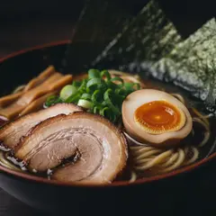 Imagen 4 Fast — A steaming bowl of ramen with chashu pork, soft-bo