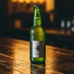 Imagen 4 Fast — A green glass bottle of craft beer with condensati