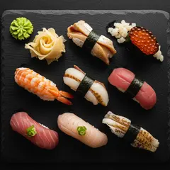 Imagen 4 Ultra — A perfectly plated sushi omakase on a black slate 