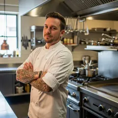 Imagen 4 Ultra — A tattooed chef in a white coat, arms crossed, con