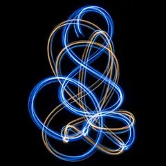 Imagen 4 — Intertwining ribbons of light in blue and gold aga