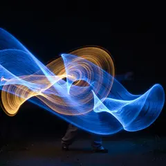 ImagineArt 1.5 — Intertwining ribbons of light in blue and gold aga