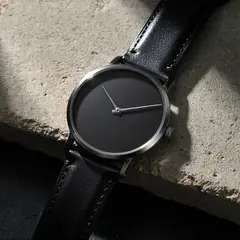 ImagineArt 1.5 — A minimalist wristwatch with a black leather strap