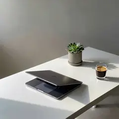 ImagineArt 1.5 — A sleek laptop on a clean white desk with a potted