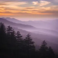 Luma Photon — A misty mountain range at sunrise, layers of purpl