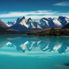 Luma Photon — A turquoise glacial lake surrounded by snow-capped