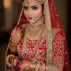 Luma Photon — An Indian bride in traditional red and gold leheng