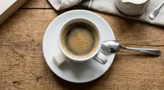 Gemini 3.1 Flash Image — A cup of coffee on a saucer, with a spoon to the r