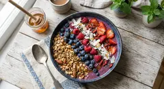 Gemini 3.1 Flash Image — A colorful acai bowl topped with fresh berries, gr