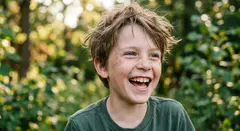 Gemini 3.1 Flash Image — A freckled boy with bright blue eyes and messy hai