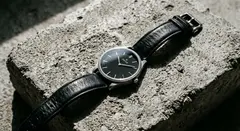 Gemini 3.1 Flash Image — A minimalist wristwatch with a black leather strap