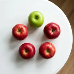 Gemini 3 Pro Image — Five red apples arranged in a circle on a white ta