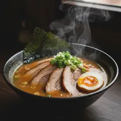 Gemini 2.5 Flash Image — A steaming bowl of ramen with chashu pork, soft-bo