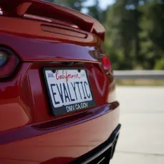 Gemini 2.5 Flash Image — A license plate reading EVALYTIC on the back of a 