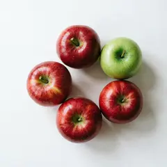 Qwen Image 2.0 — Five red apples arranged in a circle on a white ta