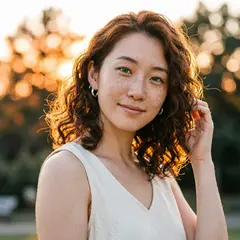 Qwen Image 2.0 — A young woman with freckles and green eyes, golden