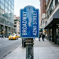 Qwen Image 2.0 — A street sign at the intersection of BROADWAY and 