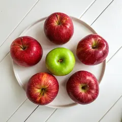 Recraft V3 — Five red apples arranged in a circle on a white ta