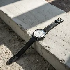 Recraft V3 — A minimalist wristwatch with a black leather strap