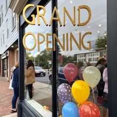 Recraft V3 — A storefront window with GRAND OPENING painted in 