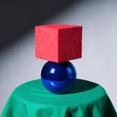 Recraft V4 — A red cube on top of a blue sphere, both sitting o
