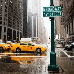 Recraft V4 — A street sign at the intersection of BROADWAY and 